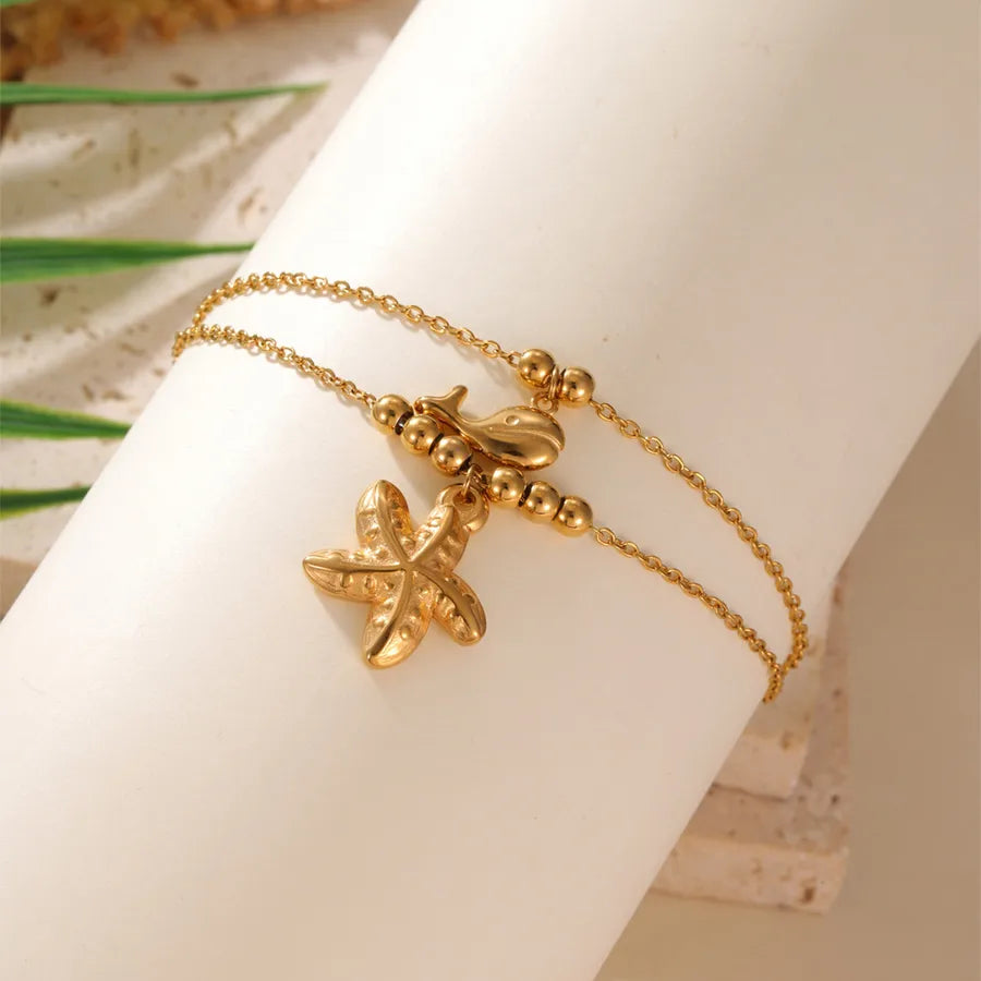 Bracelet Cheville Dauphin Étoile de Mer Tropical Acier 18K | WristArt Doré