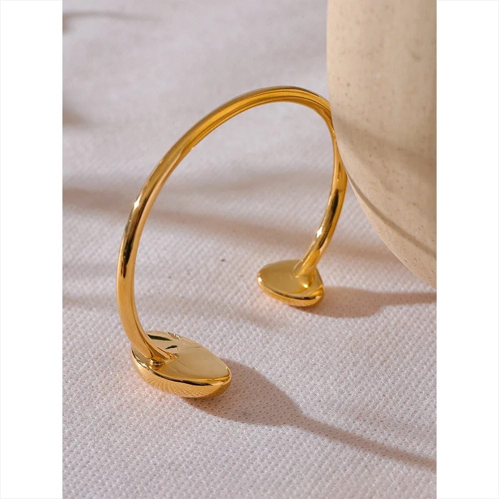 bracelet manchette acier doré femme