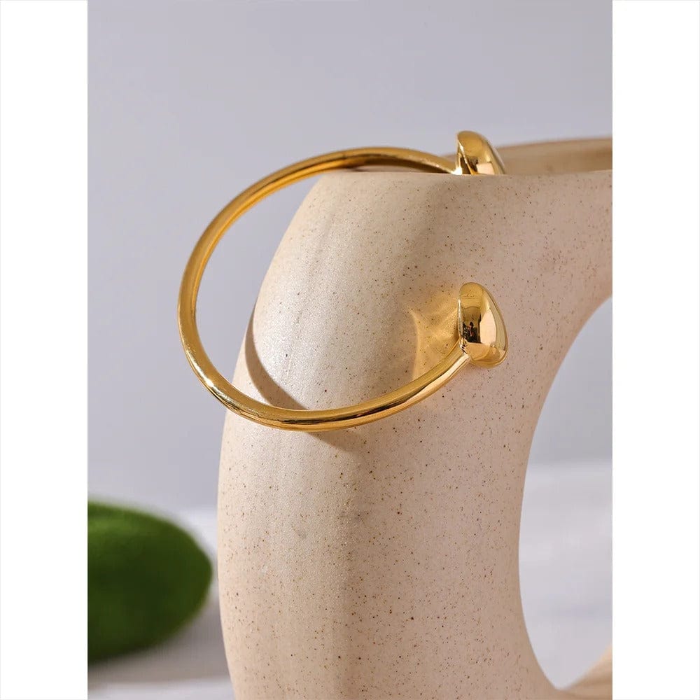 bracelet manchette acier doré femme