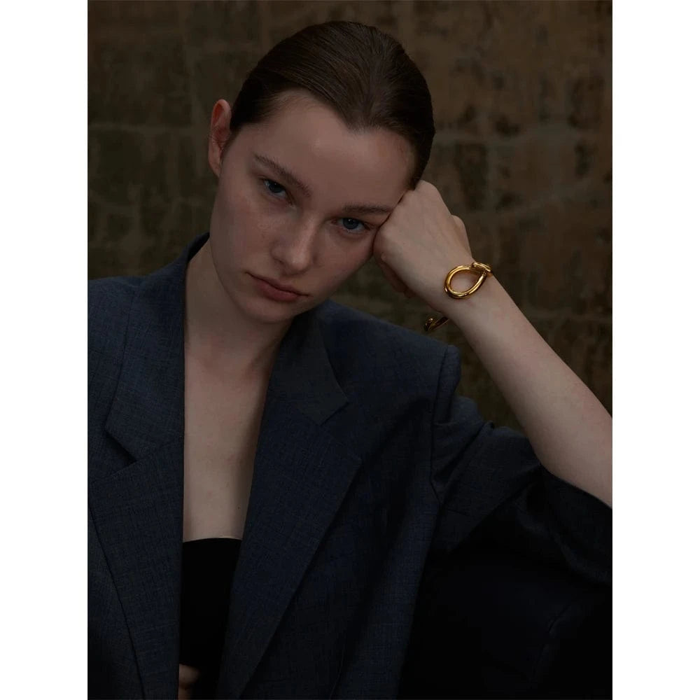 bracelet acier doré nœud élégant