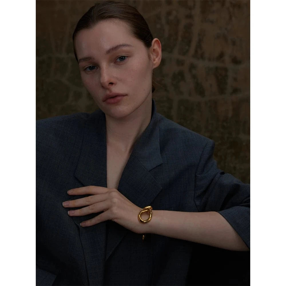 bracelet acier doré nœud élégant