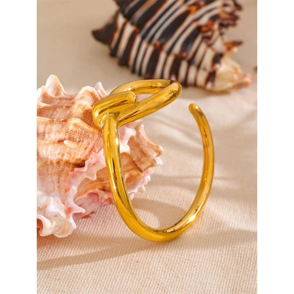 bracelet acier doré nœud élégant