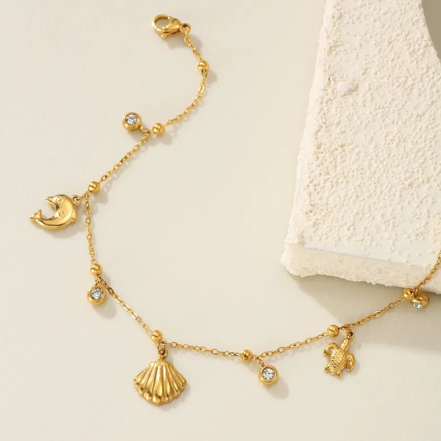 Bracelet Cheville Dauphin Style Marin Acier Zircon | WristArt Doré & Argenté