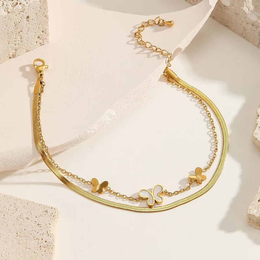 Bracelet Cheville Papillon Relief Acier Titane Doré | WristArt Dorée