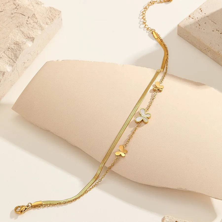 Bracelet Cheville Papillon Relief Acier Titane Doré | WristArt Dorée