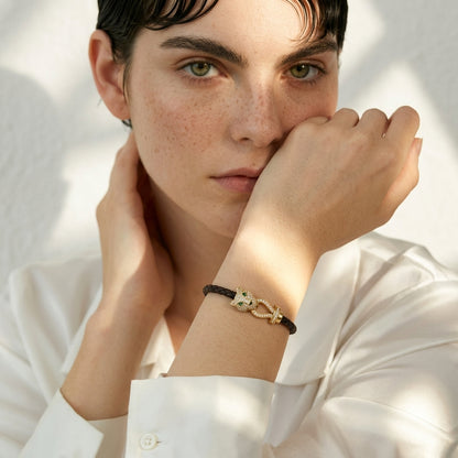 Bracelet cuir tressé femme tête de panthère dorée | WristArt