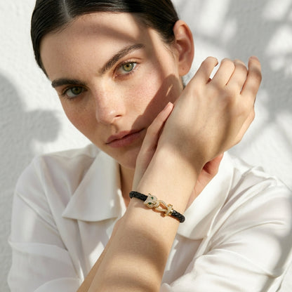 Bracelet cuir tressé femme tête de panthère dorée | WristArt