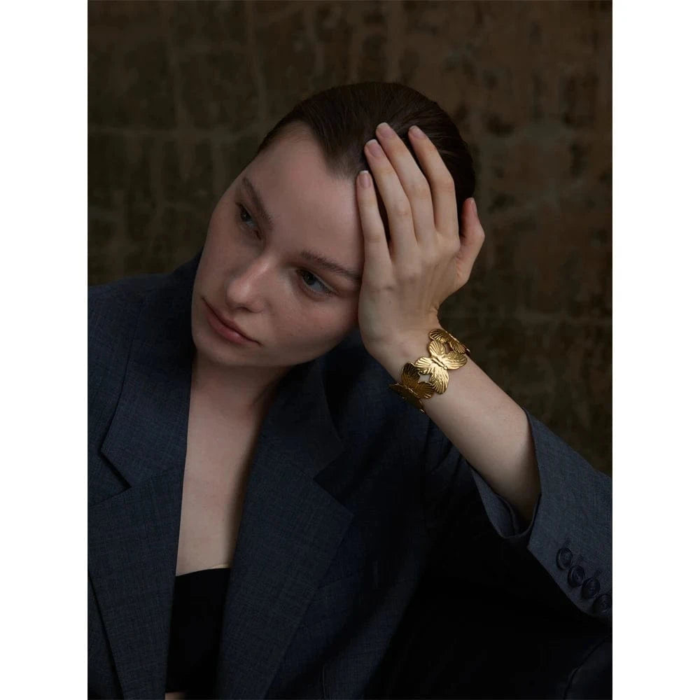 Bracelet papillon doré sculptural